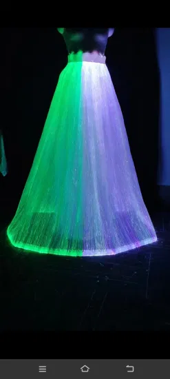 La nuova moda illumina le gonne alla moda arcobaleno abbagliante che si illuminano al buio